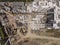 Aerial of a construction site, midrise residential condominiums constructed with prefab concrete. Several tower cranes erected