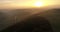 Aerial copter flight over the charming misty fields, mountains and forests during the sunset in Heilbronn, Germany. 4k