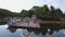 Aerial. Couple in local residential houses on Middle Harbour and moored yachts