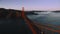 Aerial Crossing the Golden Gate Bridge toward the Marin Headlands Bay, San Francisco evening