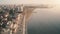 Aerial Cyprus sunset city beach coastline. Larnaca downtown. Yacht marina, hotels resort buildings