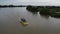 Aerial descending down view tourist go for river cruise at Sungai Perak