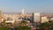 Aerial descending view Mersin coastal city commercial buildings panorama with mosque