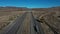 Aerial desert interstate freeway traffic California Nevada area 4K 210