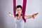 Aerial different inversion antigravity yoga in a hammock