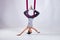 Aerial different inversion antigravity yoga in a hammock