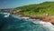 Aerial dolly over Anse Songe beach close to granite rocks and boulders