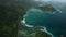 Aerial dolly over Anse Souillac beach to Port Launay Marine Park, Mahe