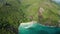 Aerial dolly over a paradise inaccessible beach hidden in the lagoon