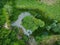 Aerial down view of secret pond in Hertford Heath woods