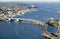 Aerial of downtown Portland, Maine showing Maine Medical Center, Commercial street, Old Port, Back Bay and the Casco Bay Bridge fr