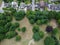 Aerial downward shot of beautiful houses with a nature backdrop