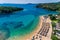 Aerial drone bird`s eye view of of Agia Paraskeui Beach with turquoise sea in complex islands in Parga area, Ionian sea, Epirus,