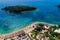 Aerial drone bird`s eye view of of Agia Paraskeui Beach with turquoise sea in complex islands in Parga area, Ionian sea, Epirus,