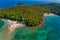 Aerial drone bird`s eye view of Bella Vraka Beach with turquoise sea in complex islands in Sivota area, Ionian sea, Epirus, Greec