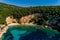 Aerial drone bird`s eye view of of Mega Drafi Beach with turquoise sea in Parga area, Ionian sea, Epirus, Greece