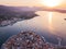 Aerial drone bird`s eye view photo of Sunset on Poros island, Greece