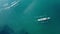 Aerial drone bird\'s eye view video of two sport canoe operated by team of young men and women