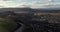 Aerial Drone clip flying over River Forth towards Stirling Castle into a low sun over Cornton village