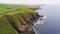 Aerial drone flight along the coast at Dingle Peninsula Ireland