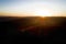 Aerial drone flight, direction Vienna over the Vienna Woods at sunrise
