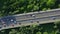 Aerial Drone Flight top down View of freeway busy city rush hour heavy traffic jam highway. Aerial view of the vehicular