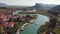 Aerial drone fly in Dalyan. River, town, summer day