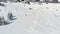 Aerial: drone flying over one person skiing in Sestriere ski resort, famous winter travel destination in Italy and Europe.