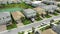 Aerial drone flying over single family homes