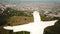 Aerial drone footage of Cristo Rey in Cali, Colombia. Jesus statue.