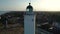 Aerial drone footage. Fly around rural an old rustic and Historic lighthouse building