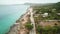 Aerial drone footage of a golf cart on the tropical road, San Andres, Colombia