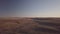 aerial drone footage over prairie pasture land at sundown in rural North Dakota