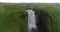 Aerial drone footage of waterfall Skogafoss on Iceland in Icelandic nature