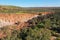 Aerial drone landscape view of Irwin River riverbank and cliffs Western Australia