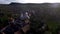 Aerial drone moving above village and church tower. Transylvania, Romania