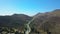 Aerial drone over countryside and long winding road, California, USA