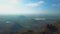 Aerial drone over countryside and long winding road and smal city, California, USA