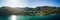 Aerial Drone Panorama Photo - Resort hotels on the Pacific Ocean coast, buried in the mountains of Costa Rica