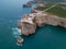 Aerial drone panoramic view of the lighthouse and cliffs at Cape St. Vincent at sunset. Algarve seascape.  Amazing landscape.Conti