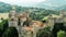 Aerial drone panoramic view of the Rocchetta Mattei castle in Italy on sunny summer day, view from above. High quality