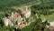 Aerial drone panoramic view of the Rocchetta Mattei castle in Italy on sunny summer day, view from above. High quality