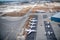 Aerial drone photo of airplanes as seen from above docked in airport space, travel concept