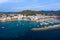 Aerial drone photo of the beautiful island of Ibiza in Spain showing the costal front golden sandy beaches with people relaxing