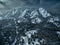 Aerial drone photo - Beautiful snow covered Flatirons mountains in Winter. Boulder, Colorado