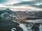 Aerial drone photo of a empty lake a huge volcanic mountain Snaefellsjokull in the distance, Reykjavik, Iceland.