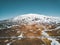 Aerial drone photo of a empty quit road road towards a huge volcanic mountain Snaefellsjokull in the distance, near