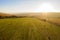 Aerial drone photo of hay rolls in the wheat