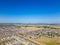 Aerial drone photo homes in Manor Texas neighborhoods growing