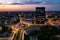 Aerial drone photo of Katowice centre with roundabout and modern office towers at evening.